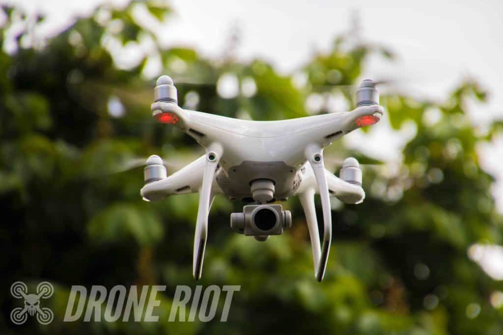 White hovering Drone White drone flying